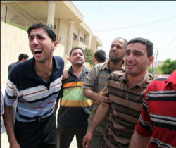 Image of Iraqi Christians mourn.