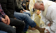 Image of Francis washing the feet of Jesus in the poor