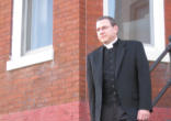 Image of Fr Paul Schenck presiding at Holy Mass - We often face problems and difficulties that seem utterly insurmountable, and we just cannot see how we can make it through them! There were times in the course of my case that I wondered how I would survive. When I flagged Becky would have a word from Scripture or a prayer that would hold me up. Come to me, Jesus says, when life threatens to overwhelm you, come to me! Whatever it is you're facing today, turn to Jesus: you will find rest for yourselves - his yoke is easy, his burden is light. 