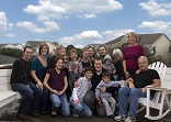 Image of The extended domestic church of the Fournier home on vacation  four years ago