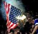Image of Protesters burn an American flag. The nation has many enemies, both within and without. 