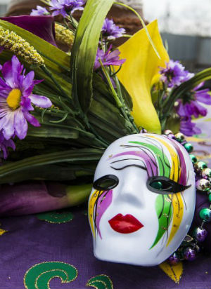 Mardi Gras is famous for its colors, masks, beads, food, floats and more (Pixabay)!