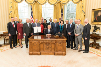 The President's Cabinet in March, shortly after it was initially formed. At the time of this image, four seats remained unfilled.