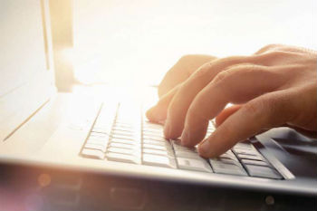 Image of Typing Computer